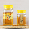 Custom 750ml clear wide mouth glass honey storage jar container bottles with deep plastic lid